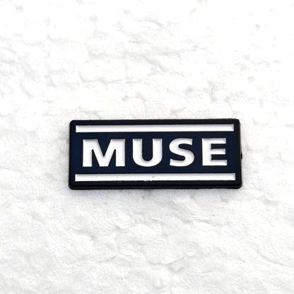 Muse Enamel Pin